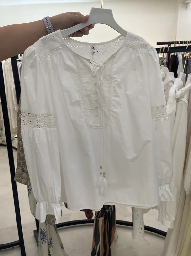 White Pintuck Long-Sleeve Shirt — Tops & Tees by NEWCOM women's wear manufacturer