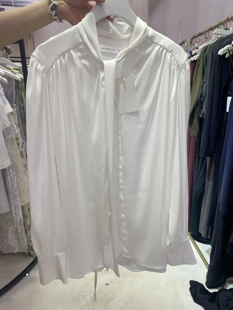 White Satin Relaxed Button-Up Shirt — Tops & Tees by NEWCOM women's wear manufacturer