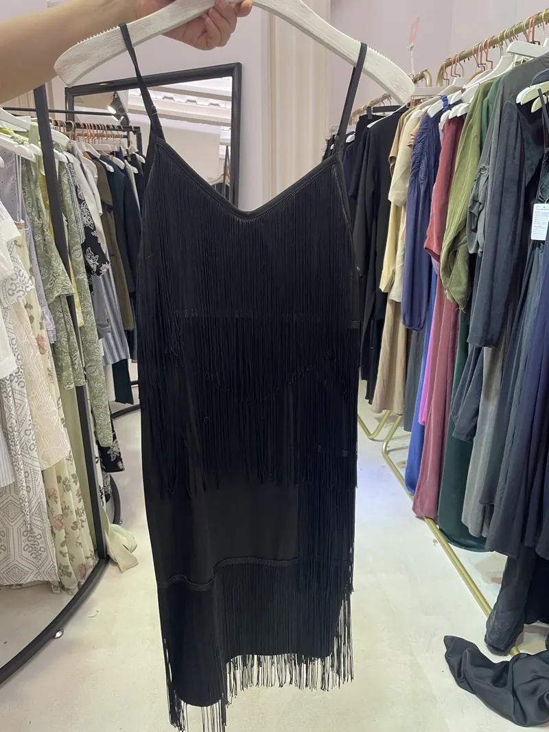 Black Fringe One-Shoulder Mini Dress — Dresses by NEWCOM women's wear manufacturer