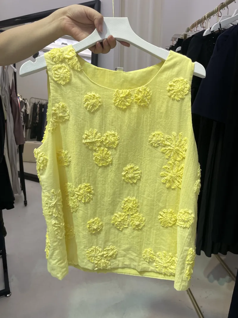 Yellow 3D Floral Sleeveless Blouse — Tops & Tees by NEWCOM women's wear manufacturer