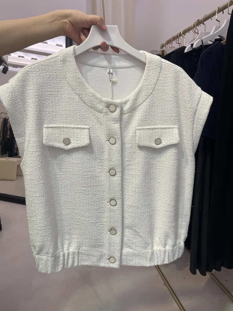 Ivory Textured Button-Front Vest — Tops & Tees by NEWCOM women's wear manufacturer