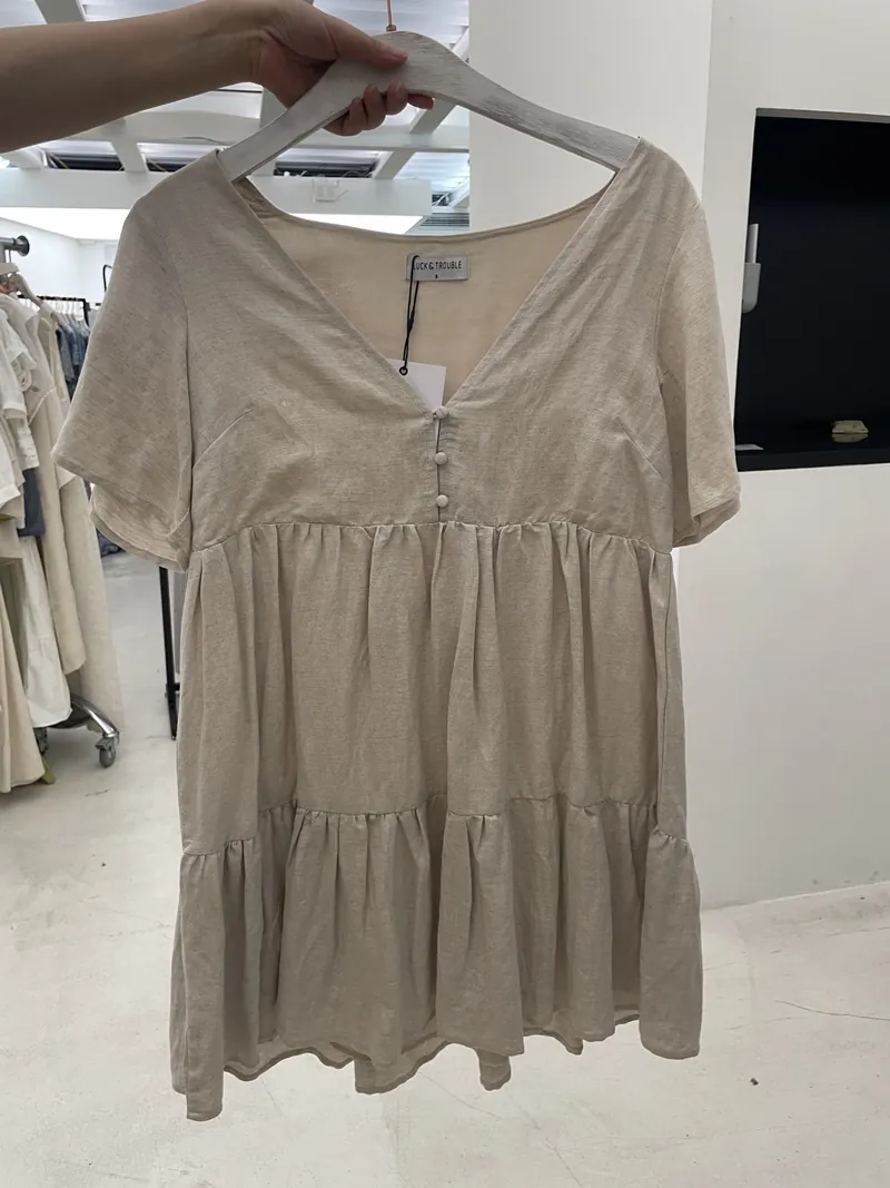 Taupe V-Neck Tiered Mini Dress — Dresses by NEWCOM women's wear manufacturer